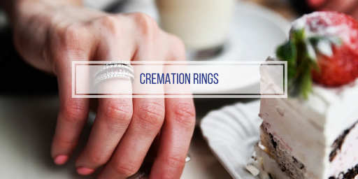 women's hand wearing a cremation ring
